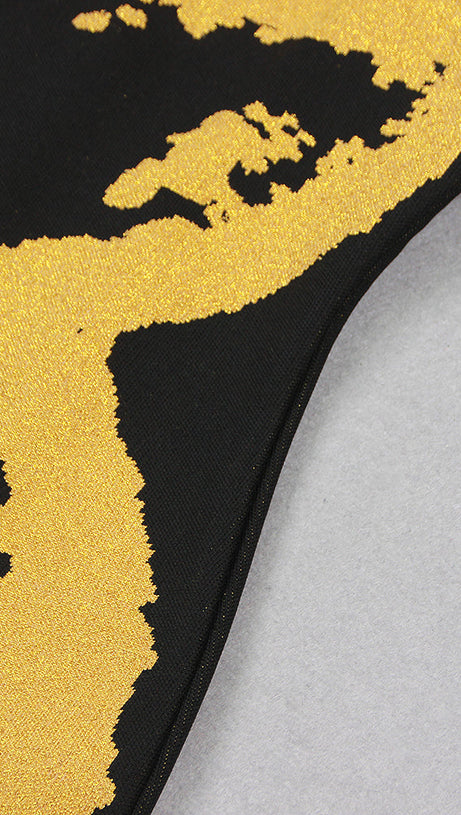 ABITO LUCENTE A MANICHE LUNGHE NERO ORO