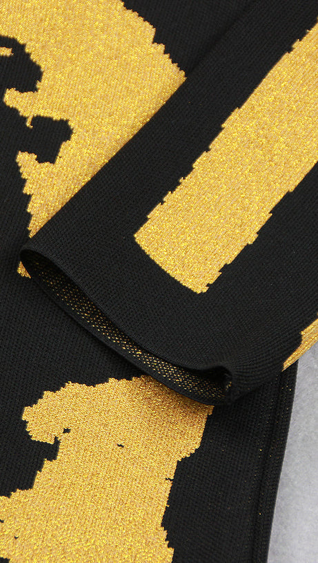 ABITO LUCENTE A MANICHE LUNGHE NERO ORO