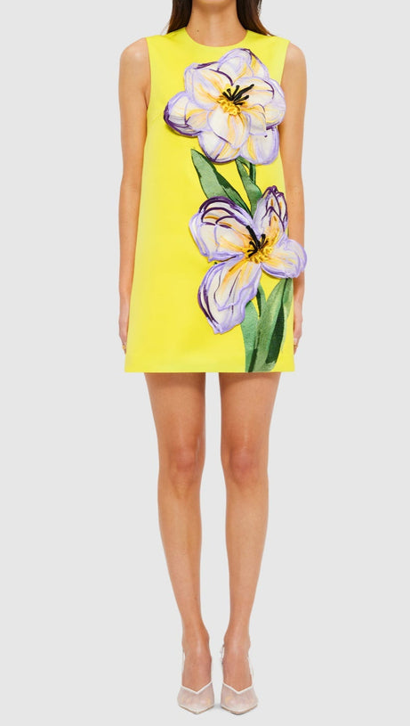 Yvonne – Minikleid mit Blumenapplikation in Gelb