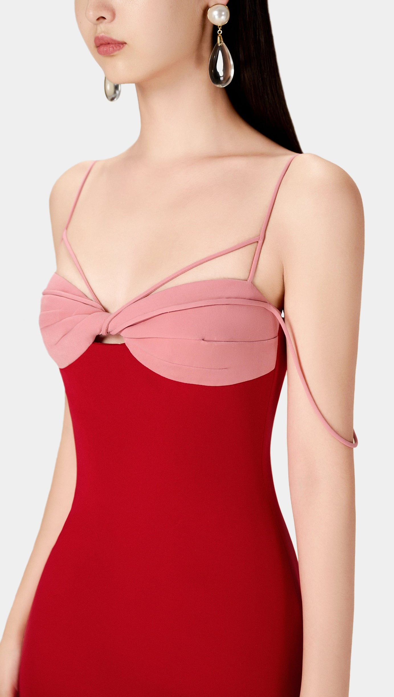 ABITO ROSSO INTRECCIATO