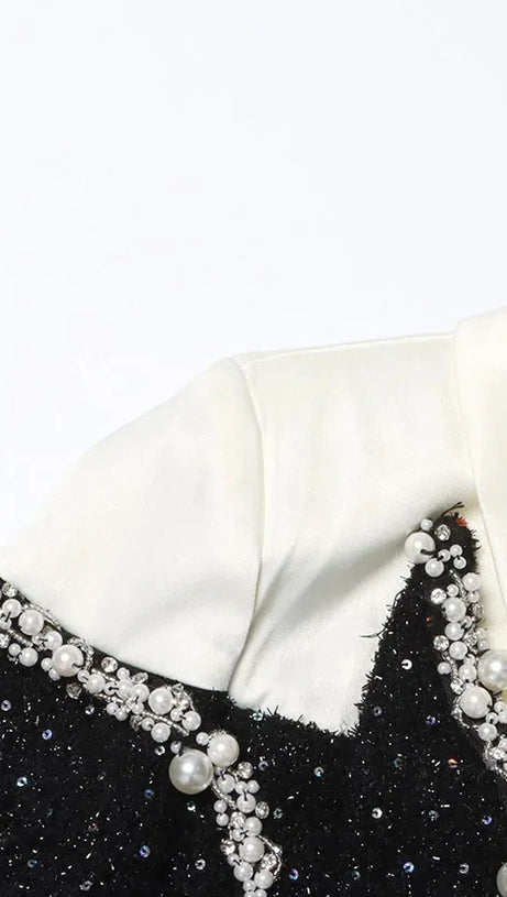 GONNA DA COMPLETO CON PAILLETTES DECORATE CON PERLE