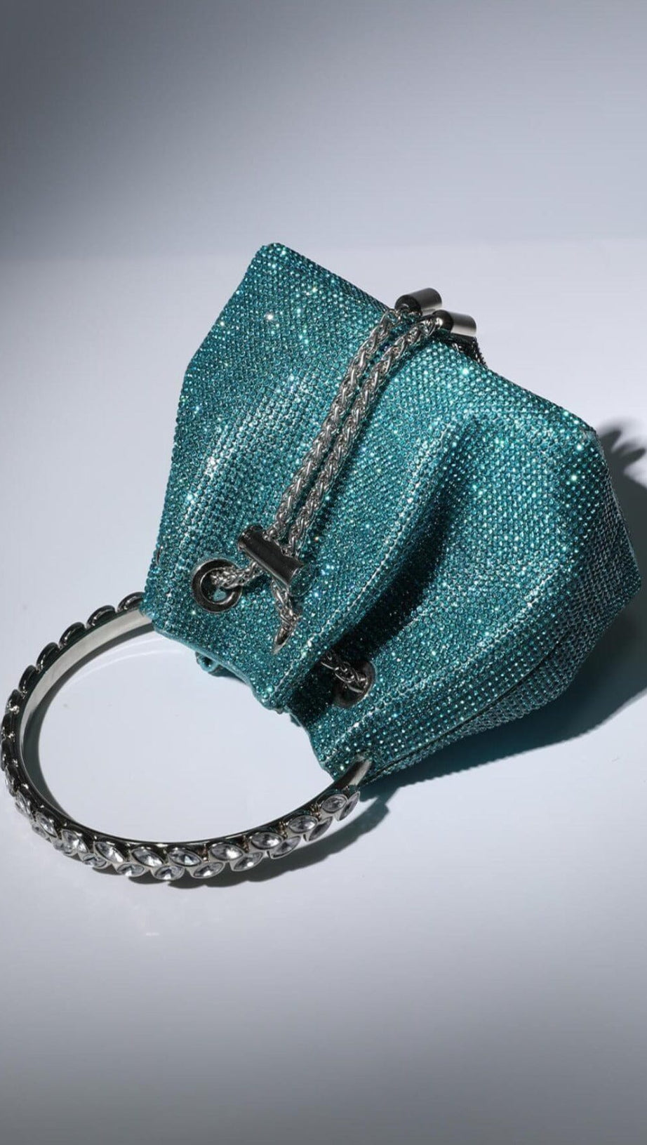 CRYSTAL EMBELLISHED BUCKET BAG IN BLUE
