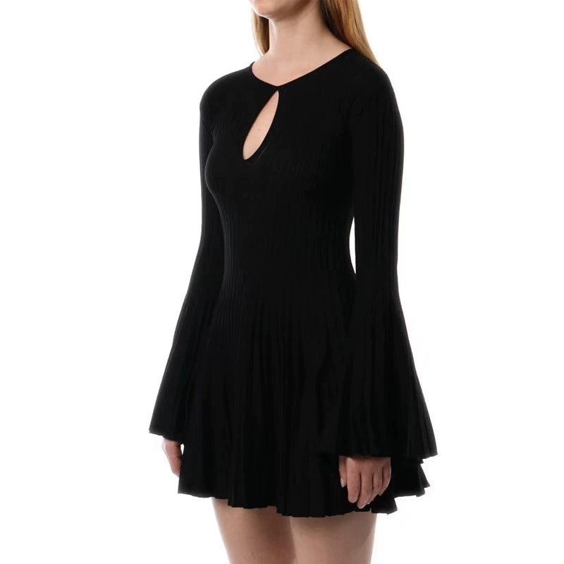 PLEATED WOOL KNIT LONG SLEEVE MINI DRESS IN BLACK