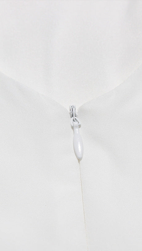 BACKLESS BOW MINI DRESS IN IVORY