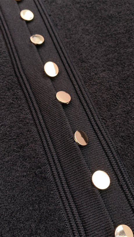 SHEILA SCHWARZES MINIKLEID AUS STRICK MIT RÜSCHEN