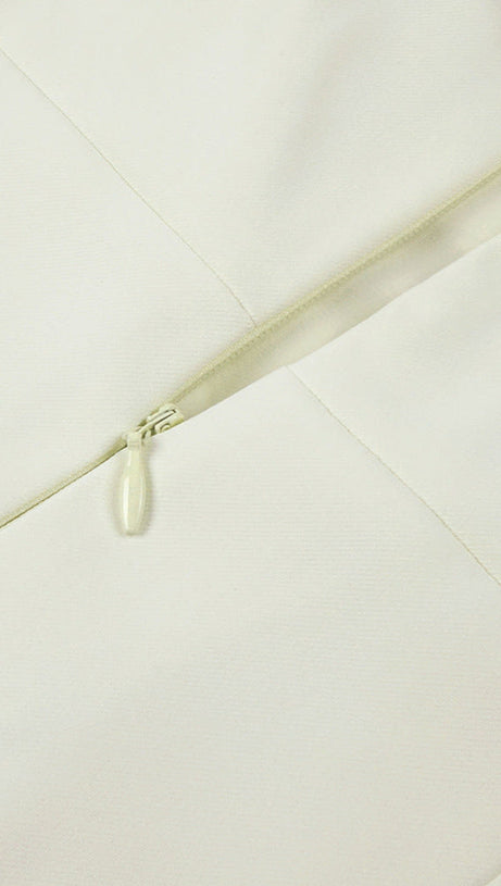 ABITO LUNGO IN TESSUTO A MANDORLA CON BOTTONI A TRIANGOLO