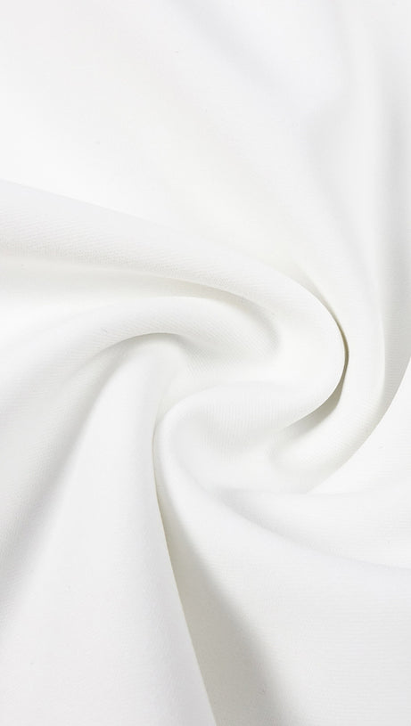 ABITO BIANCO A MANICHE LUNGHE CON SPALLE SCOPERTE