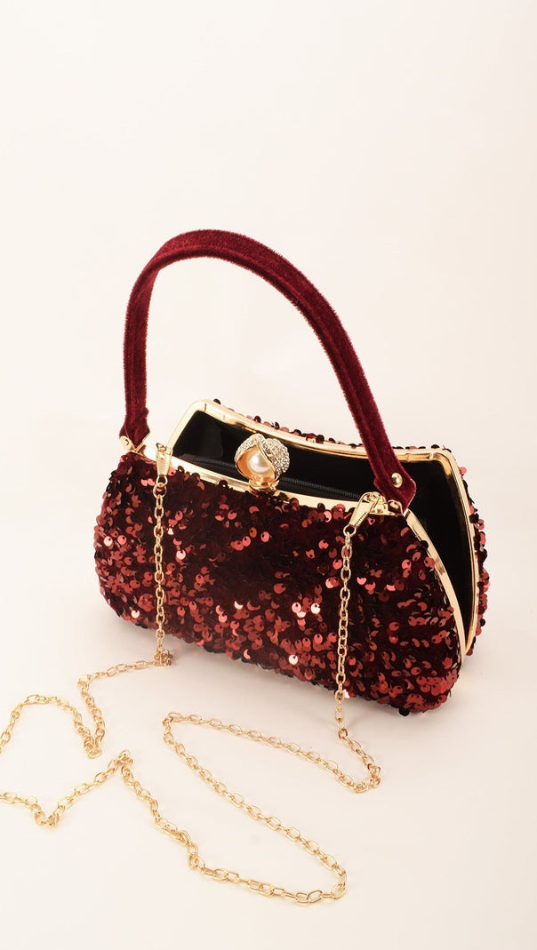 CLUTCH MIT EINFARBIGEN PAILLETTEN