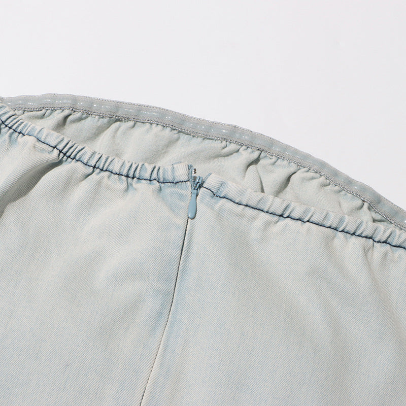 BERLIN FLORAL DENIM JUMPSUIT IN LIGHT WASH