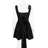 BACKLESS BOW MINI DRESS IN BLACK