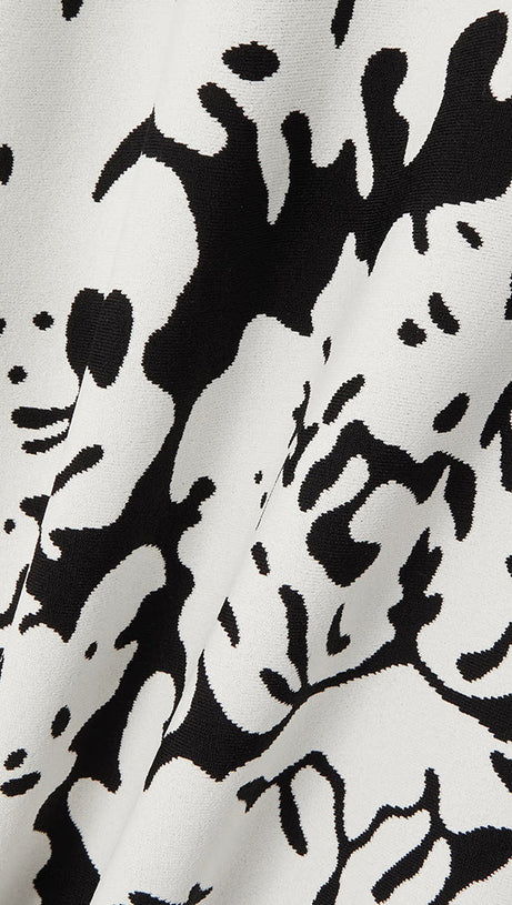 MINIKLEID AUS STRETCH-STRICK MIT BLUMENMUSTER