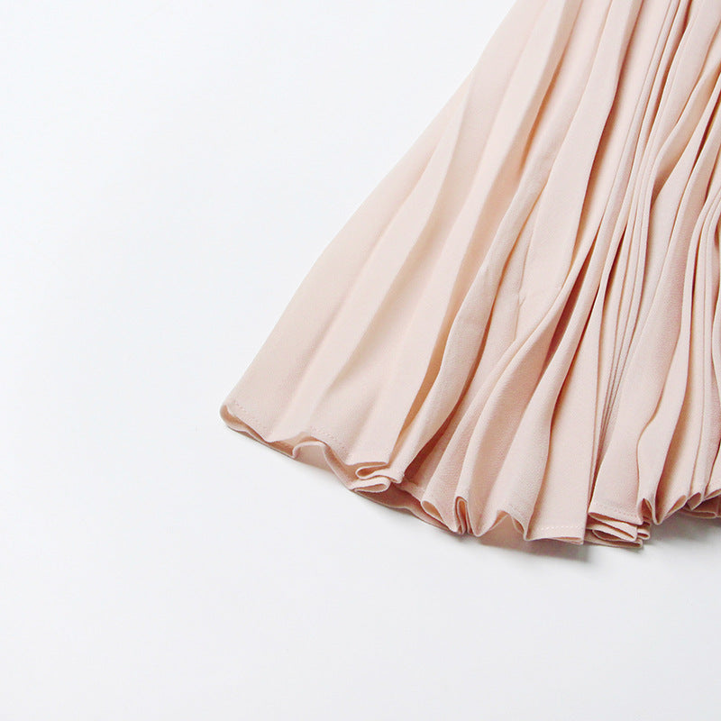 ÄRMELLOSES MIDIKLEID AUS STRICK MIT FÄLLEN IN APRICOT