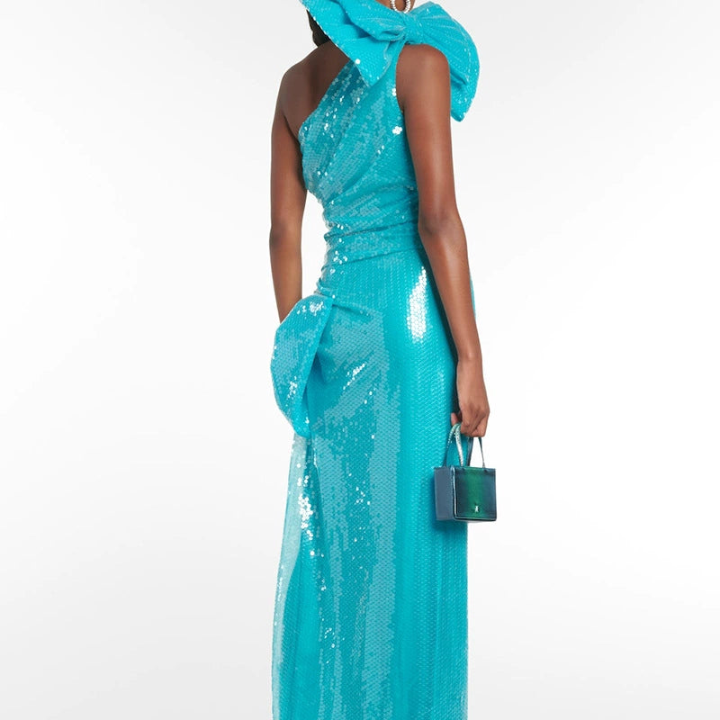 ONE SHOULDER BOW SEQUIN MAXI DRESS IN BLUE