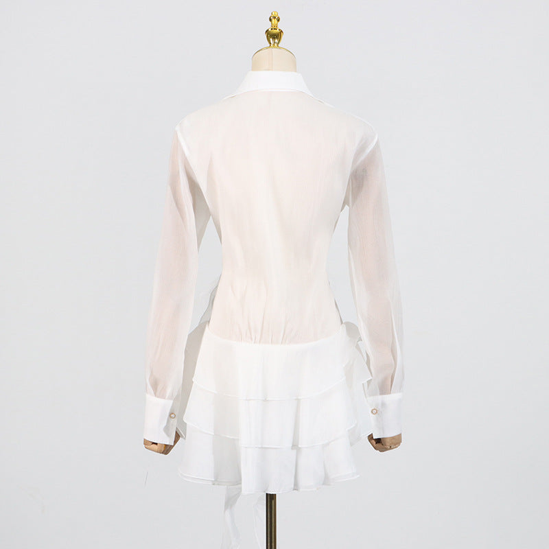 MINI ABITO CON FIORI E NASTRO A VOLANT IN BIANCO