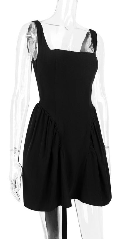 BACKLESS BOW MINI DRESS IN BLACK