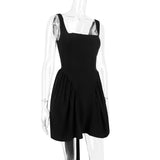 BACKLESS BOW MINI DRESS IN BLACK