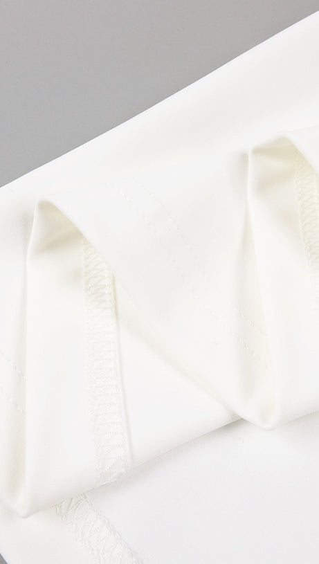 ABITO BIANCO A MANICHE LUNGHE CON SPALLE SCOPERTE