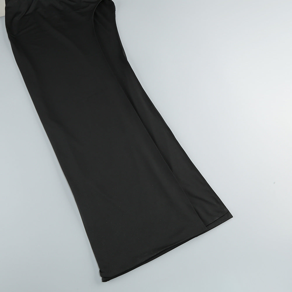 Maxikleid mit Schlangenriemen und Kristallen in Schwarz 