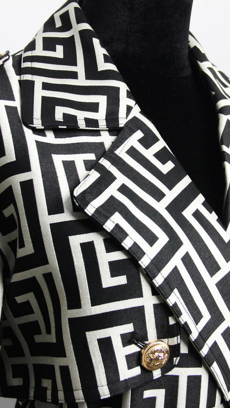 TRENCH NERO CON MONOGRAMMA