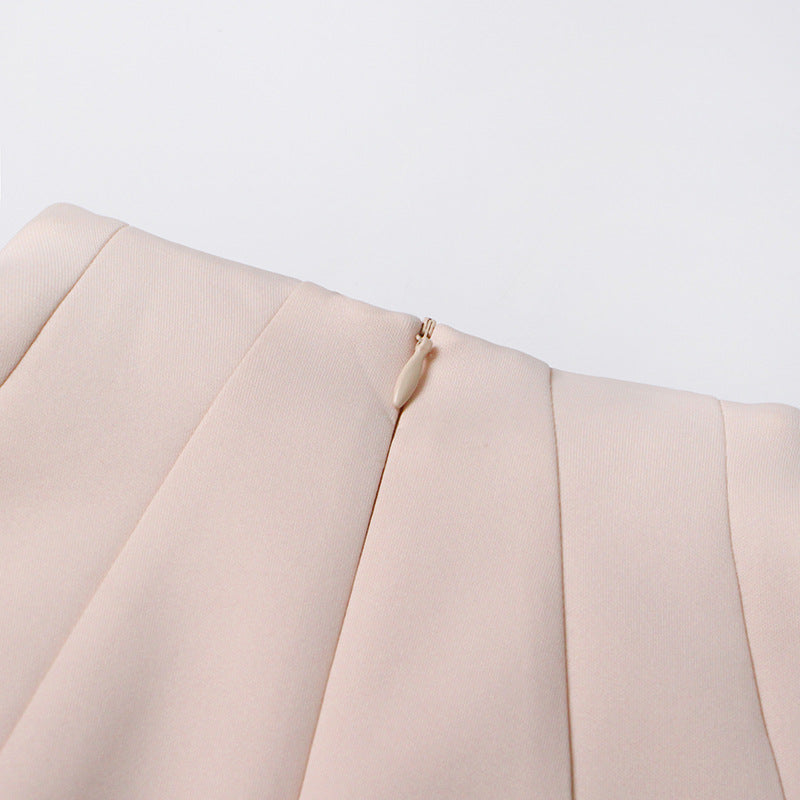 ÄRMELLOSES MIDIKLEID AUS STRICK MIT FÄLLEN IN APRICOT