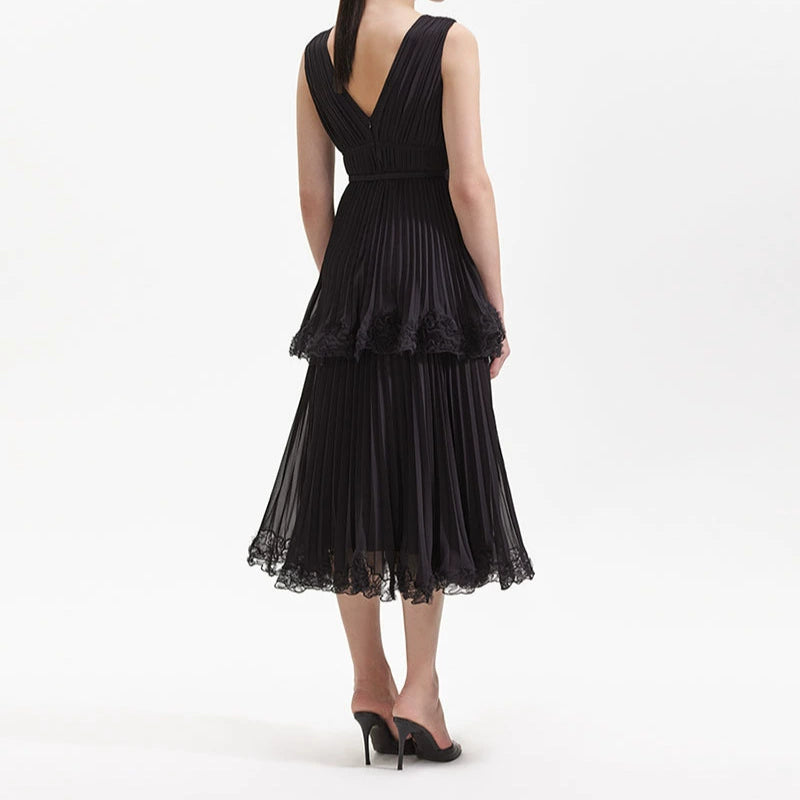 NANCY SLEEVELESS PLEATED TIERED MIDI DRESS IN BLACK