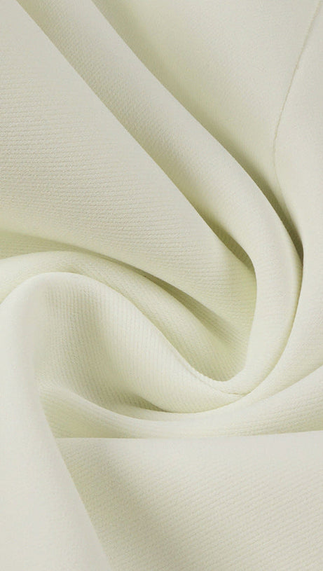 ABITO LUNGO IN TESSUTO A MANDORLA CON BOTTONI A TRIANGOLO