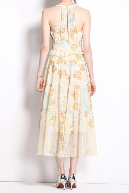ELVIRA PRINT SLEEVELESS HALTERNECK MIDI DRESS IN YELLOW