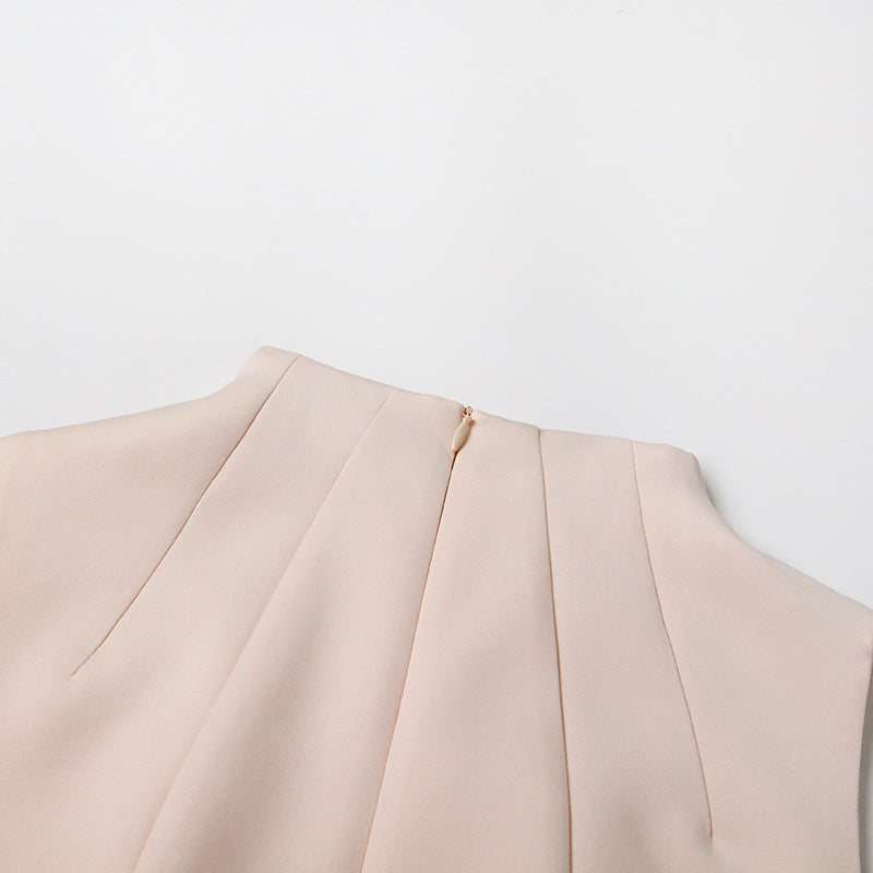 ÄRMELLOSES MIDIKLEID AUS STRICK MIT FÄLLEN IN APRICOT