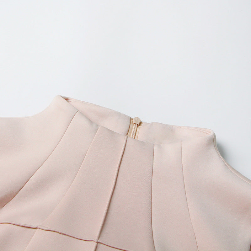 ÄRMELLOSES MIDIKLEID AUS STRICK MIT FÄLLEN IN APRICOT