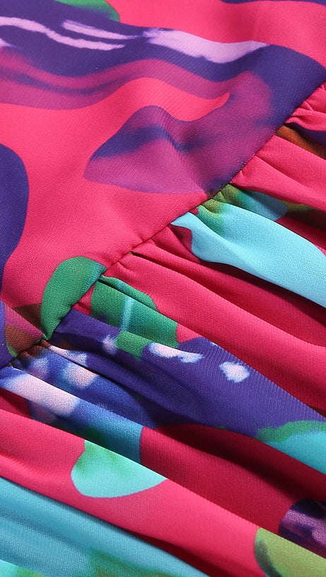 Lila bedrucktes Midikleid mit offenem Rückenschlitz und ausgehöhlter Vorderseite