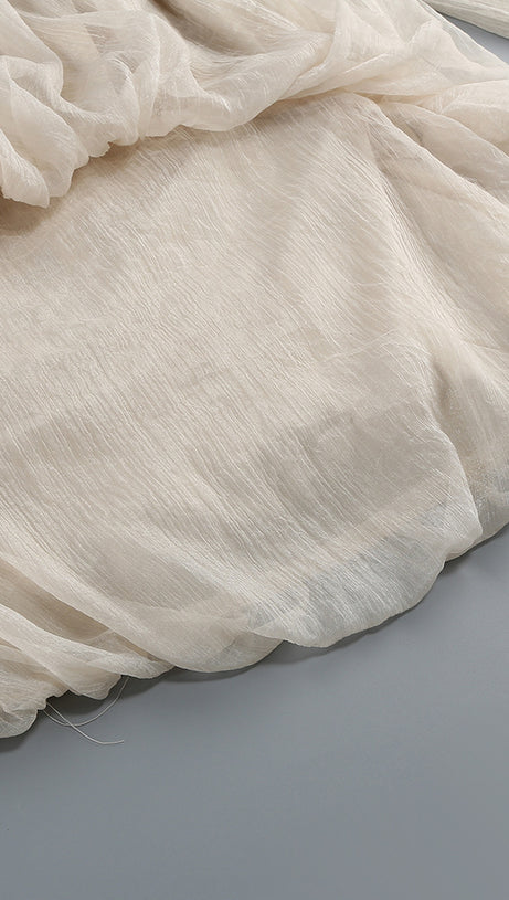 Beiges, schulterfreies, transparentes Minikleid mit Neckholder 