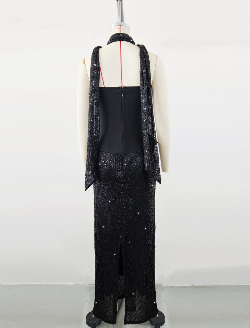 Black top and sequined floor-length skirt suit