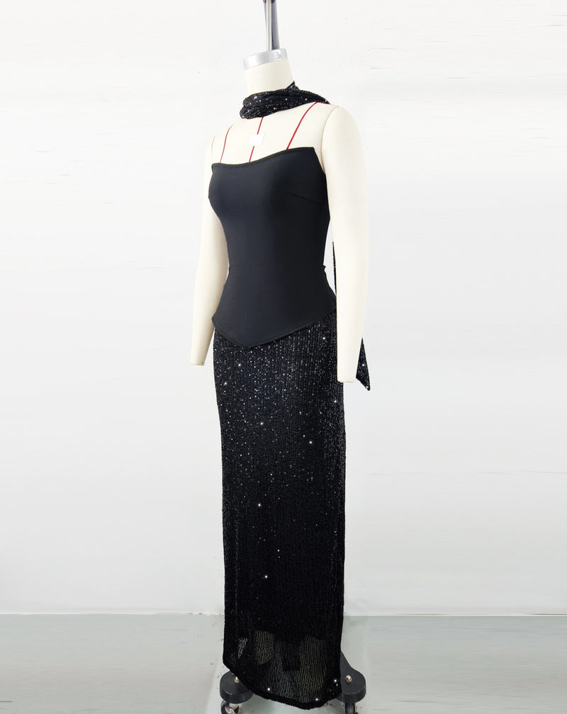 Black top and sequined floor-length skirt suit