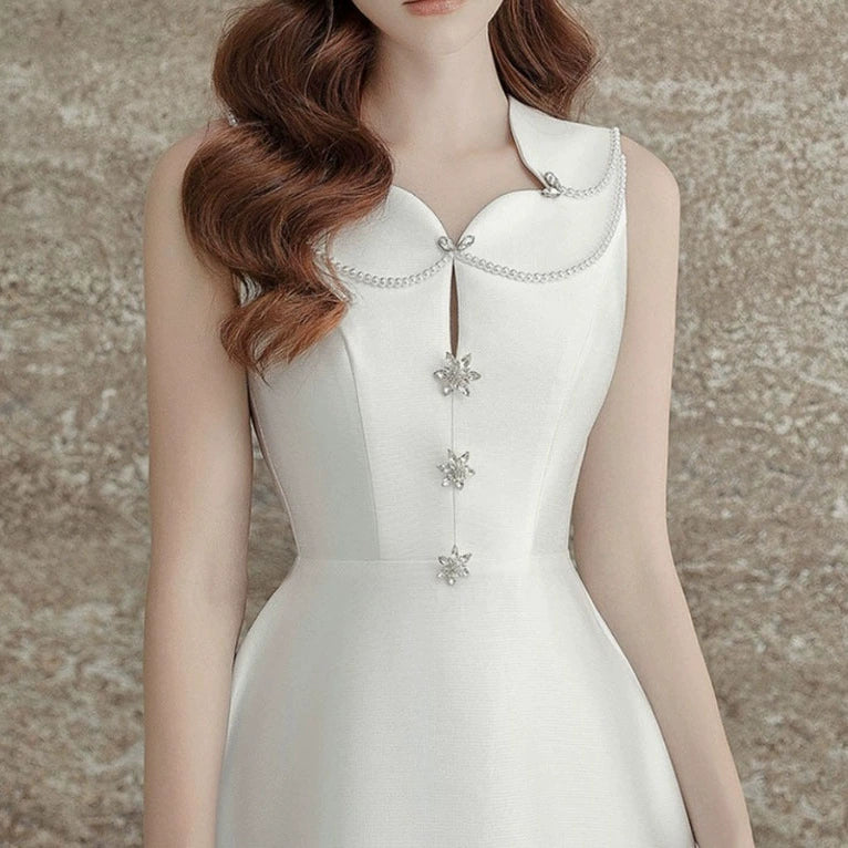 PEARL EMBELLISHED A LINE MIDI DRESS IN WHITE