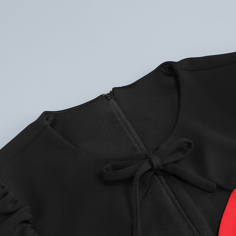 MINIKLEID MIT HERZSCHLEIFE UND CUTOUT
