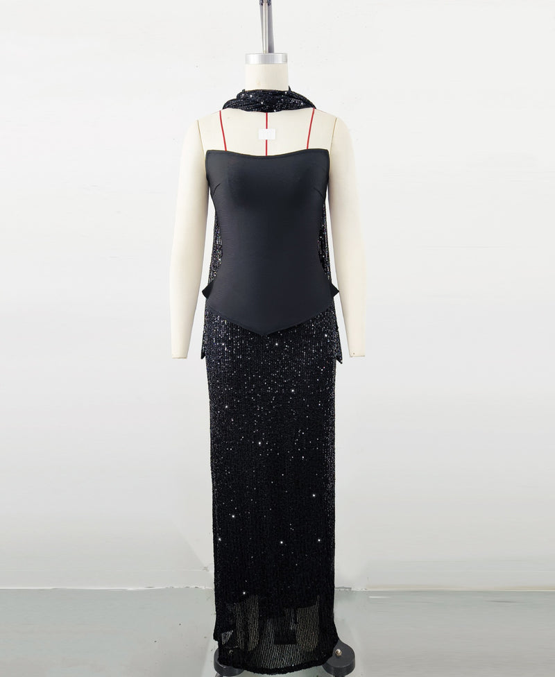 Black top and sequined floor-length skirt suit