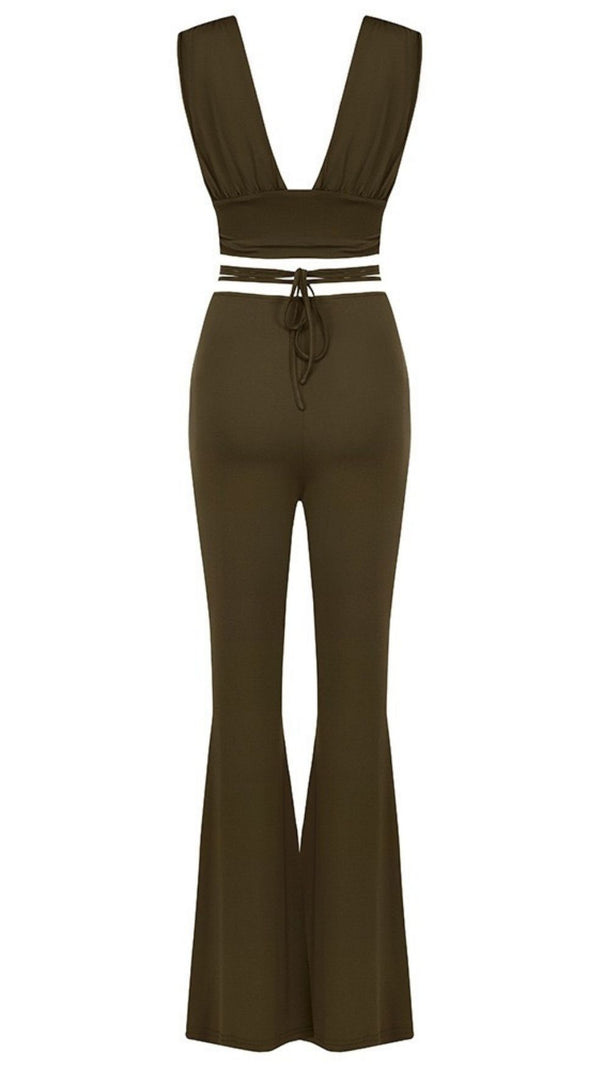 OPEN-BACK TOP AND HIGH-WAISTED BOOTCUT TROUSERS.