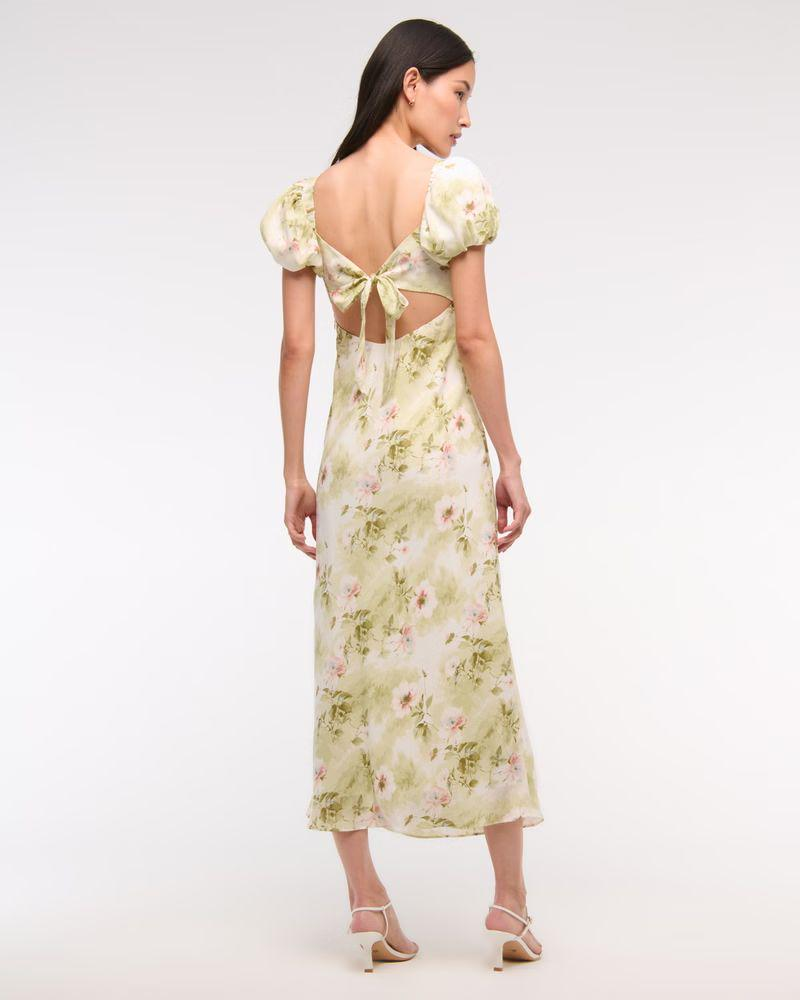 Kleid mit V-Ausschnitt und geblümten Puffärmeln