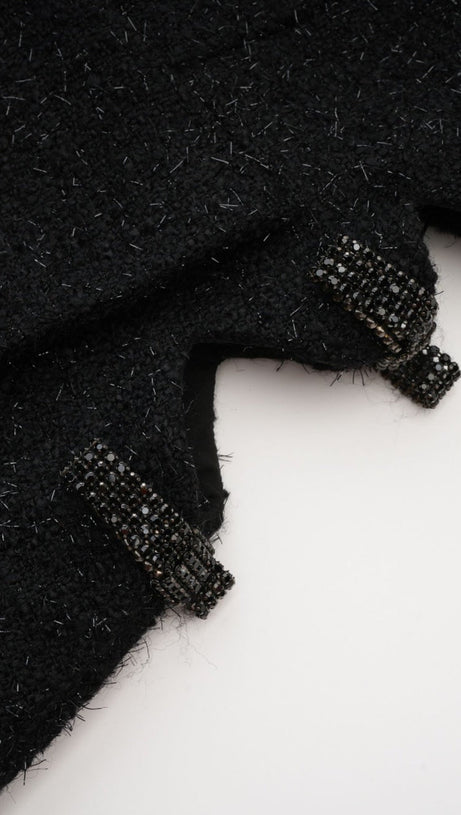 MINI ABITO NERO CON FIOCCO E TAGLIO