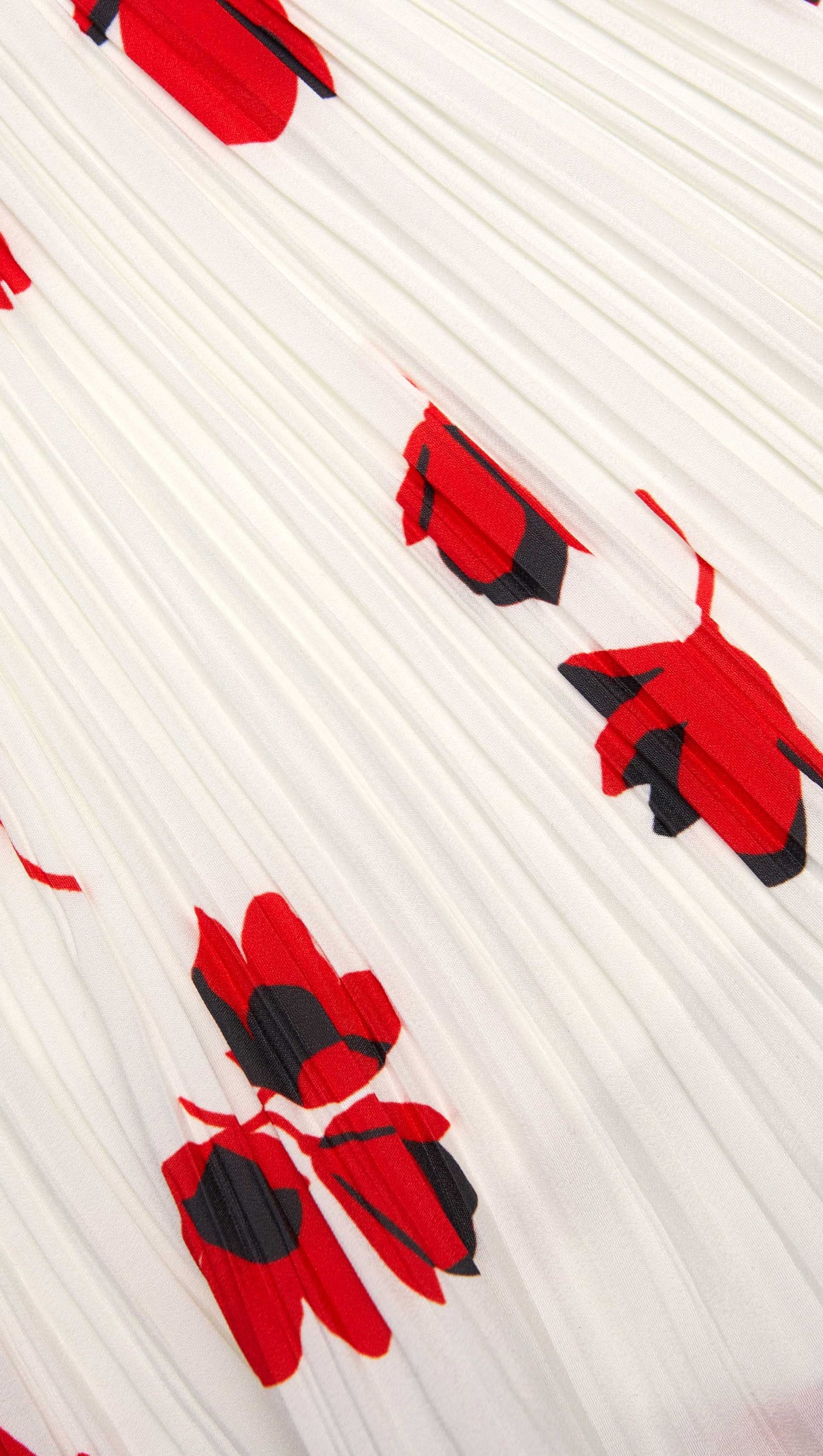 Weißes Plissee-Top mit Blumenmuster