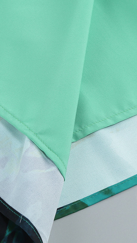 ABITO CON APERTURA SUL PETTO E ABITO MIDI VERDE