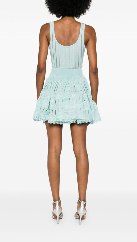 ARCHETYPES RIBBED POINTELLE-KNIT MINI DRESS IN GREEN