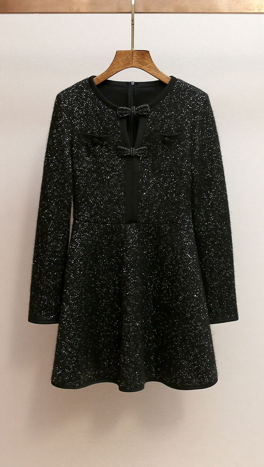 Dazzling Black Sequin Knit Mini Dress with Chic Bow Cut-Out