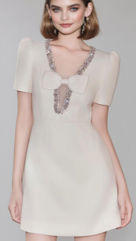 V-NECK DIAMOND CHAIN BOW MINI DRESS IN IVORY
