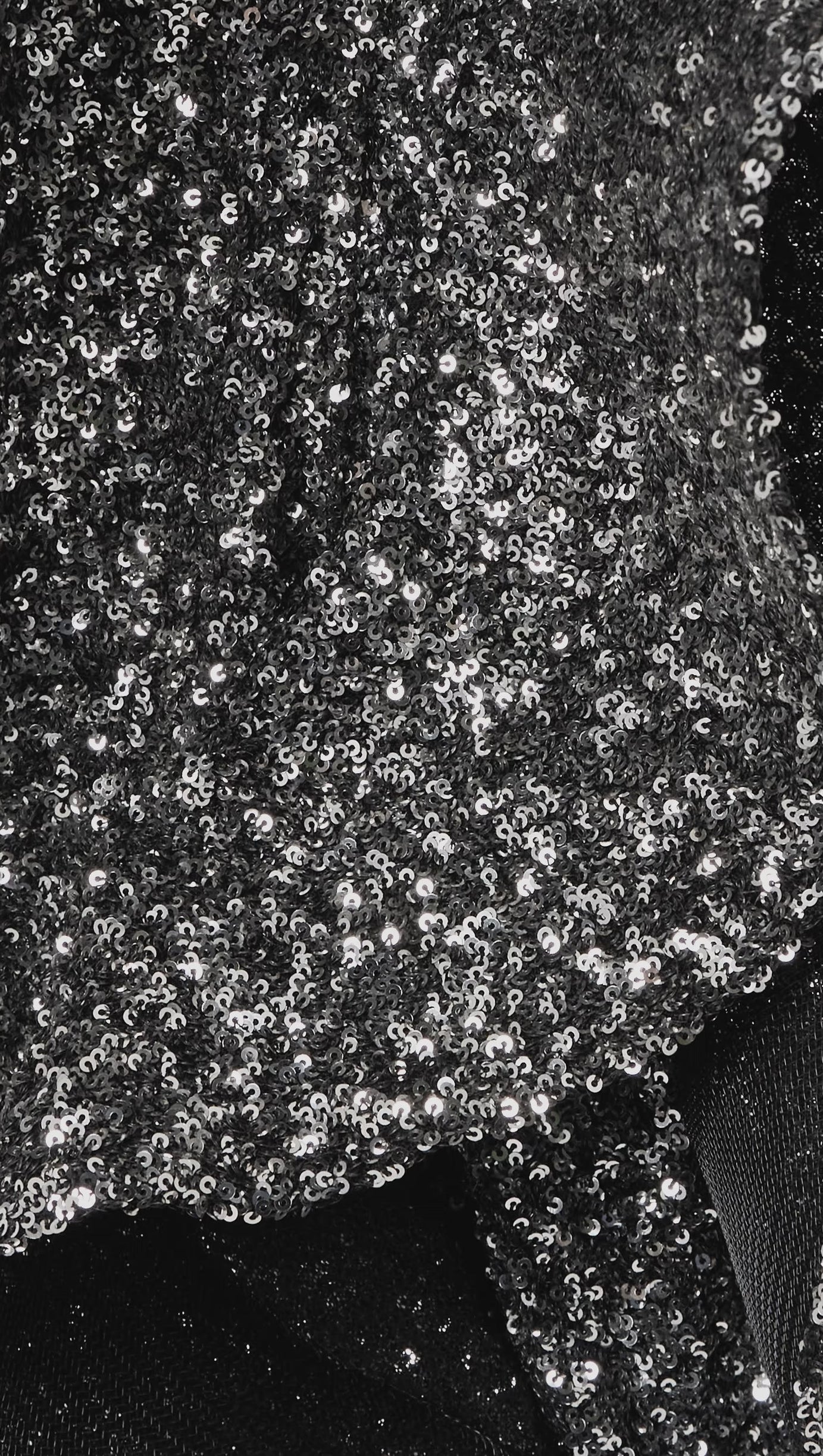 ABITO IN CREPE ASIMMETRICO CON PAILLETTES E VOLANT IN ARGENTO