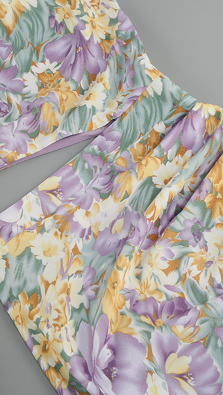 ABITO MIDI ASIMMETRICO CON MANICA MONOSPALLA E VOLANT