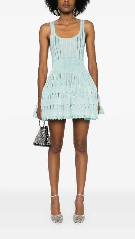 ARCHETYPES RIBBED POINTELLE-KNIT MINI DRESS IN GREEN