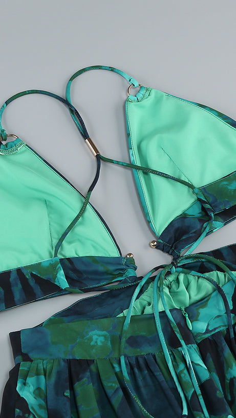 ABITO CON APERTURA SUL PETTO E ABITO MIDI VERDE