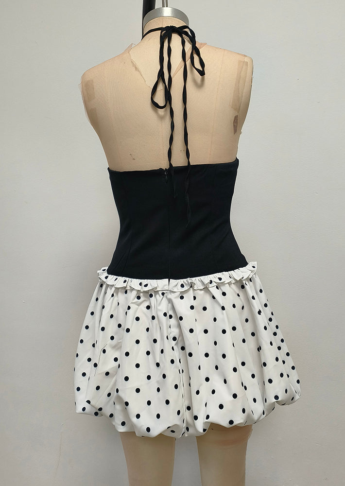 Schwarz-weißes Minikleid mit Perlen 
