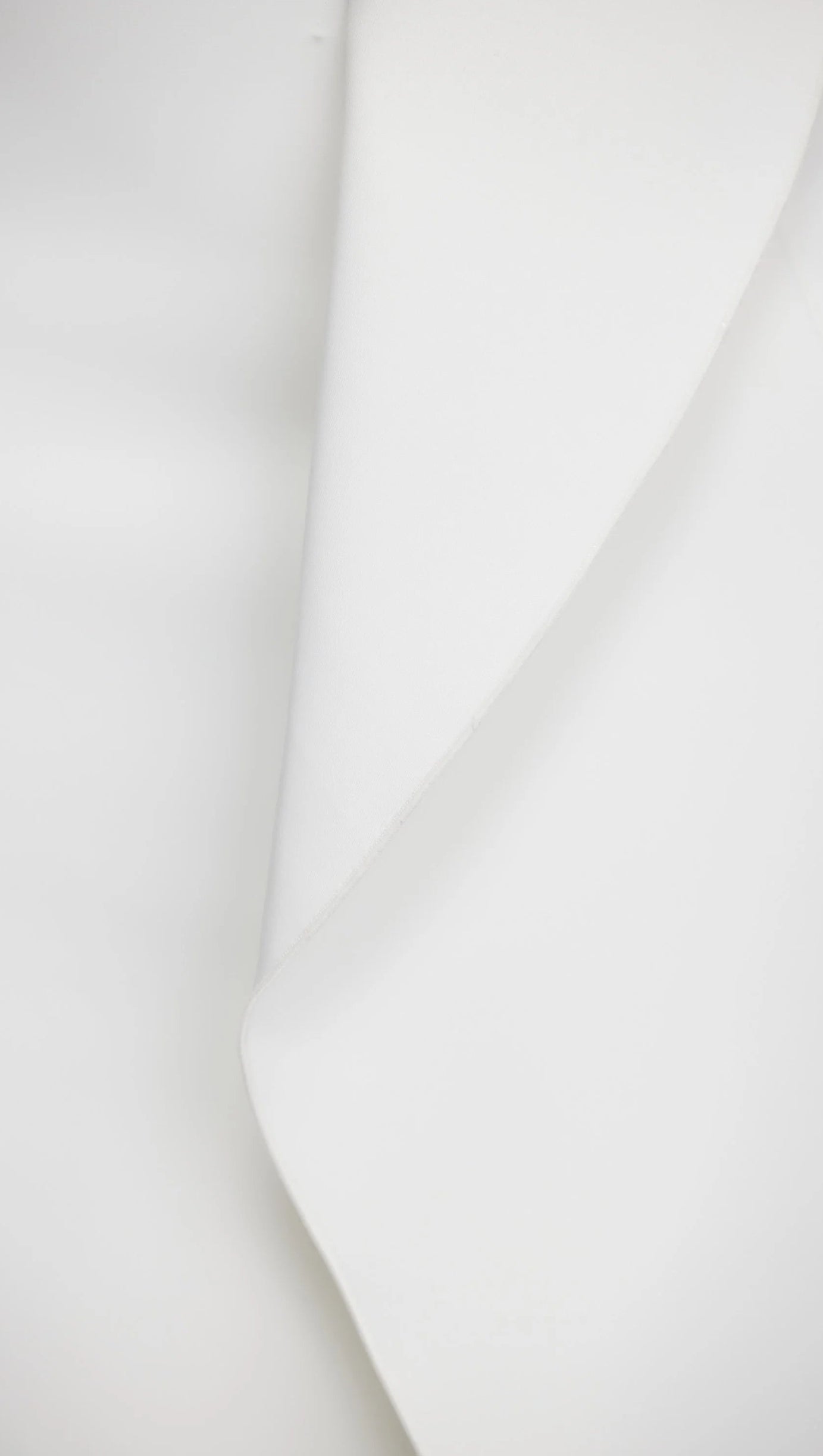 IRREGULAR RUFFLE FISHTAIL SKIRT IN IVORY